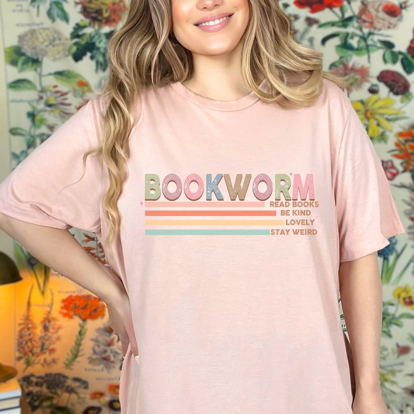 The word &quot;Bookworm&quot; in pastel print along with &quot;Read books, be kind, lovely, stay weird&quot;