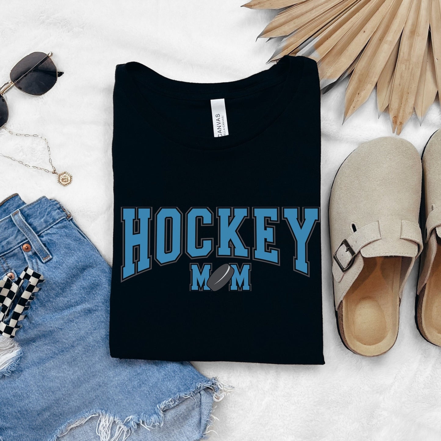 Hockey Mom Shirt in varsity style font with the &quot;O&quot; in mom replaced with a hockey puck.