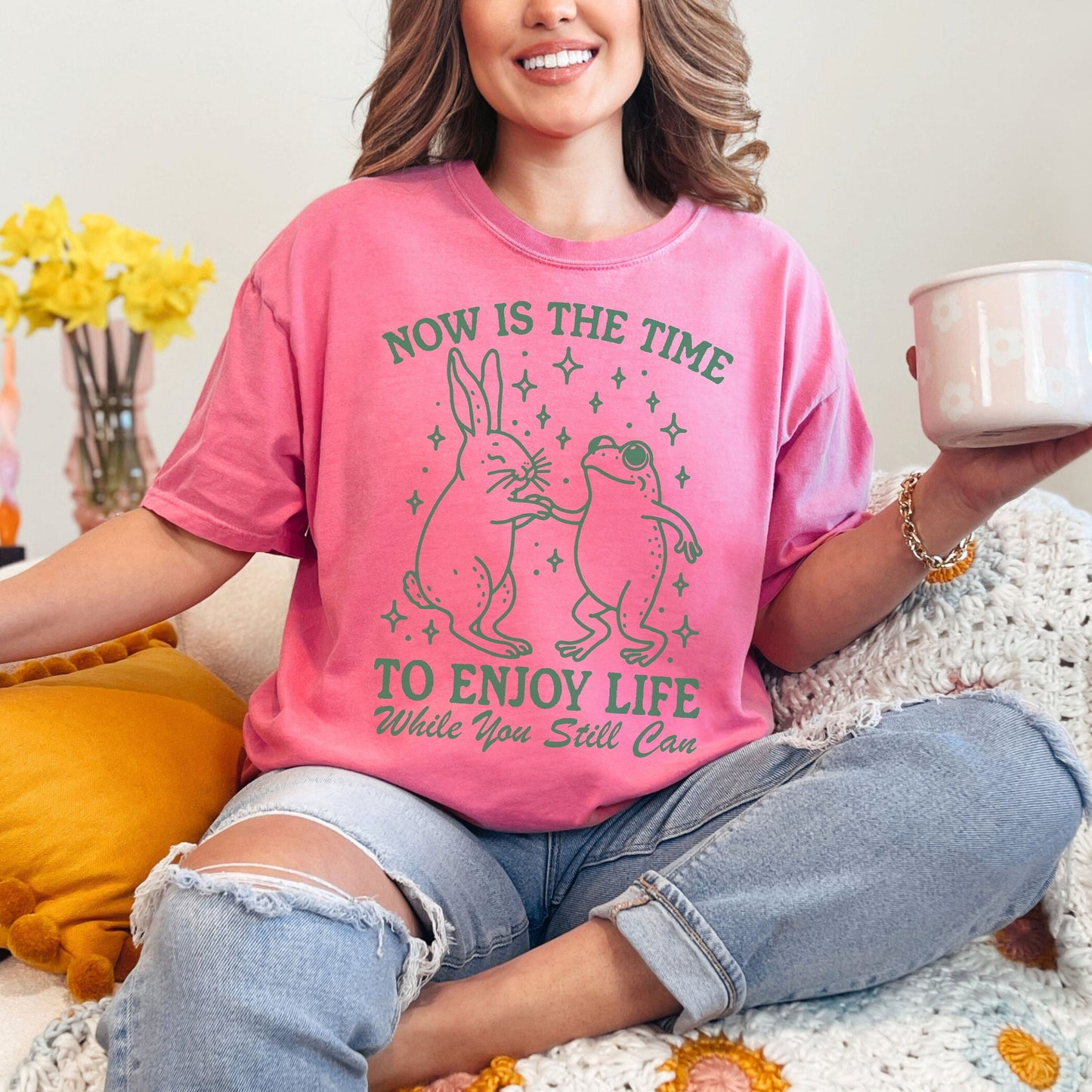 &quot;now is the time to enjoy life while you still can&quot; comfort colors shirt with a rabbit and frog shaking hands.