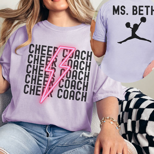 custom cheer coach with coaches name on back on a comfort colors shirt