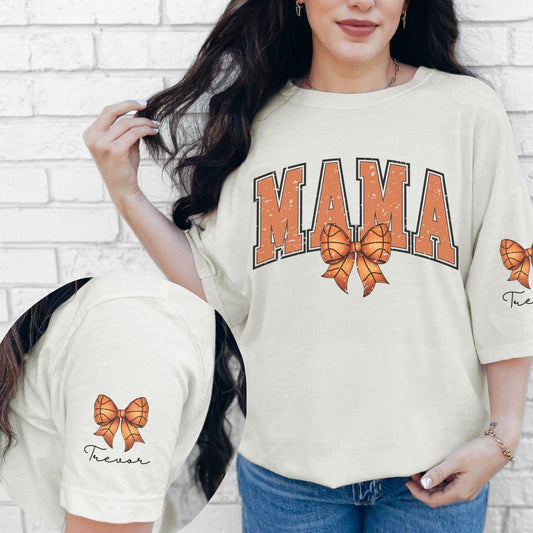 Basketball Mama with basketball coquette bow and custom name on sleeve of shirt