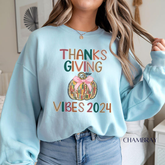 thanks giving vibes 2024 with a btushtroke pumpkin on a comfor t colors heavy sweatshirt